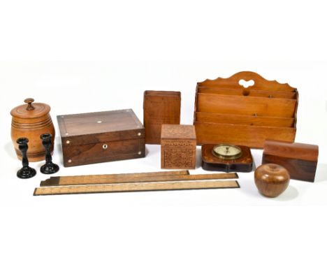 A Victorian rosewood sewing box of rectangular form with mother of pearl inlay, the hinged cover enclosing fitted compartment