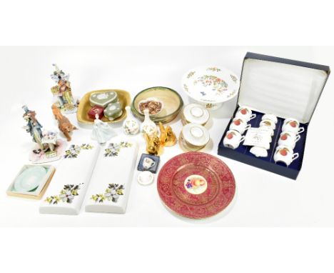A quantity of decorative ceramics including a modern Royal Worcester floral decorated plate, a pair of clown figures, etc.