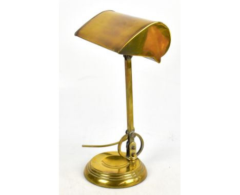 An Edwardian patent Anglepoise type students lamp, with circular base, height 41cm.&nbsp;Additional InformationGeneral light 
