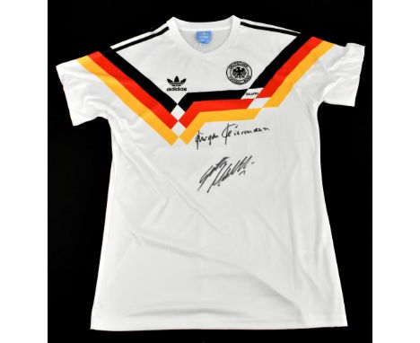 GERMANY; a 1990 retro style shirt, signed to the front by Klinsmann and Matthaus, size XL.Additional InformationCreasing and 