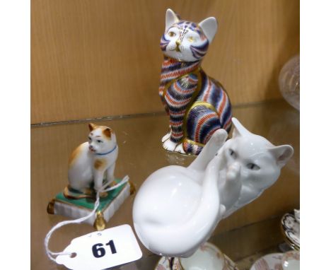 A Royal Crown Derby cat paperweight   together with a Royal Copenhagen kitten, 727, and a miniature Samson of Paris porcelain