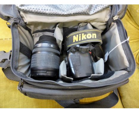 A Nikon D90 digital camera together with a Nikon DX AF-S Nikkor 18-105mm lens and camera bag (3) 