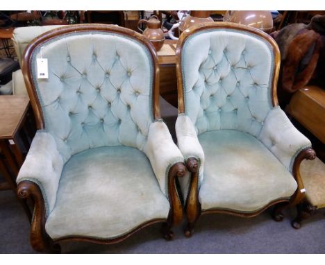 A scarce pair of Victorian carved walnut showframe button back armchairs (both a/f) 