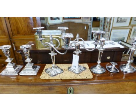 A pair of 19th century silver plate copper candlesticks   by Benetfink &amp; Co.,; together with a pair of silver plate on co