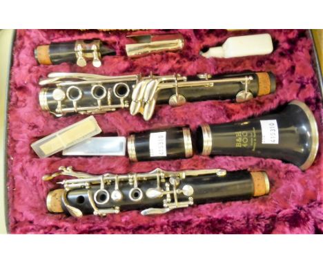 A Boosey and Hawkes 400 clarinet with case. 