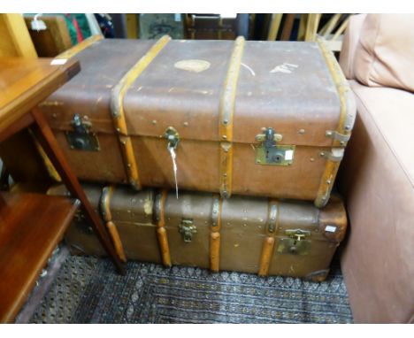 A pair of vintage canvas and wood travel trunks with lift out trays (2) 