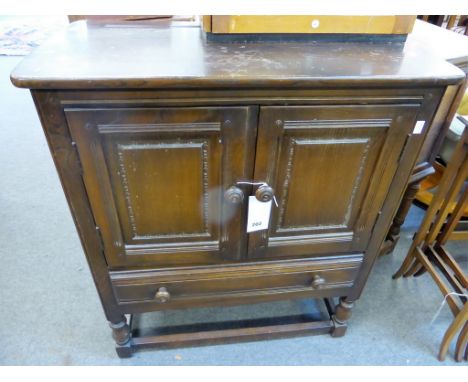 An Ercol dark elm small side cabinet. 