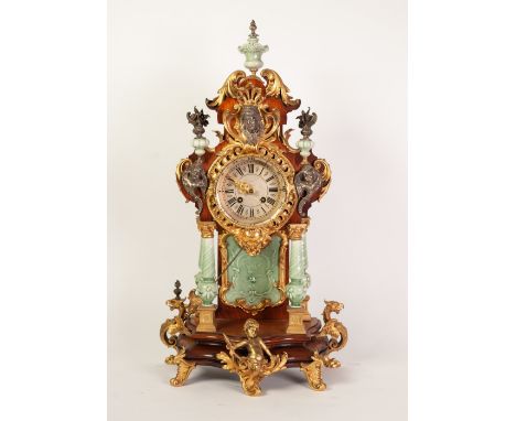 REPRODUCTION GILT METAL AND CELADON GLAZED PORCELAIN MOUNTED MAHOGANY MANTLE CLOCK IN THE ROCOCO STYLE, the 4 ½" silvered Roa