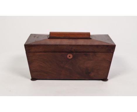 VICTORIAN FIGURED MAHOGANY TEA CADDY, of sarcophagus form, the interior fitted with twin lidded compartments, flanking a cent