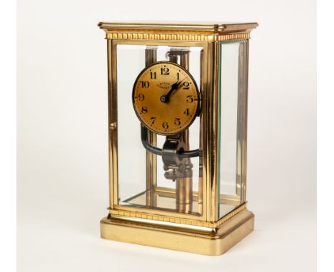 EARLY TWENTIETH CENTURY BULLE CLOCKETTE ELECTRIC FOUR GLASS BRASS MANTLE CLOCK, the 3 1/2" Arabic dial above the magnetic pen