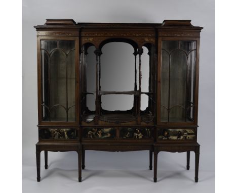 EDWARDIAN PAINTED, LINE INLAID AND CARVED MAHOGANY BREAKFRONTED DISPLAY CABINET, the moulded top with short back and raised e