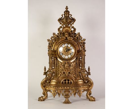 REPRODUCTION RENAISSANCE STYLE GILT METAL LARGE MANTLE CLOCK, the 4" twelve part Roman dial with gilt scroll centre, powered 