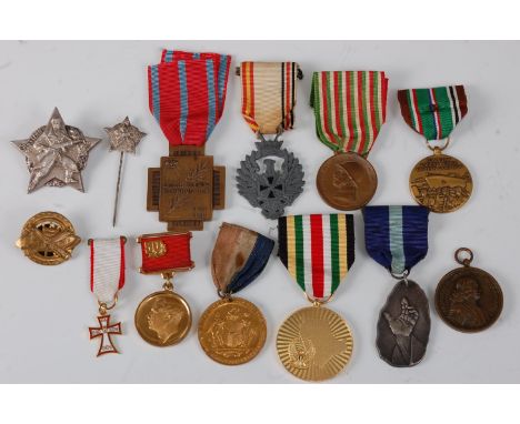 A 1939-45 Czechoslovakia Partisan badge and matching stick pin, together with various military and commemorative medals to in