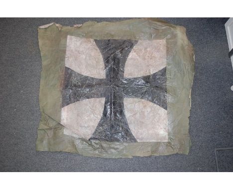 A large patch of canvas with Imperial German Cross, possibly removed from an aeroplane, 75 x 83cm.
