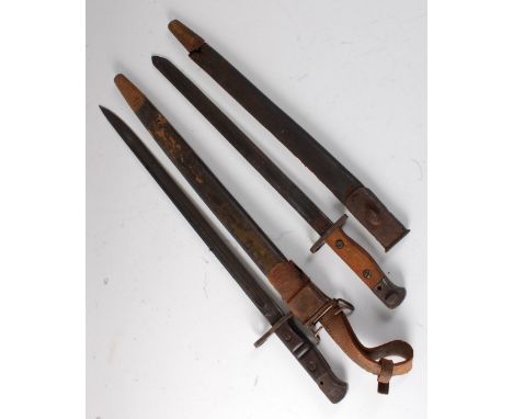 An American 1913 pattern Remington bayonet, having a 43cm single edged fullered blade and two piece walnut grip, housed in a 