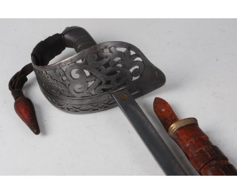 An 1892 pattern Infantry Officer's sword, the 82.5cm blade etched with a crowned VR cypher within foliage, marked to the fort