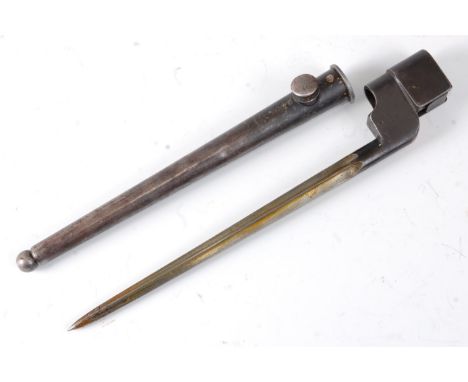 A British No.4 Mk I spike bayonet, having a 20cm cruciform blade, numbered 26125 to the socket, housed in a steel scabbard, 2