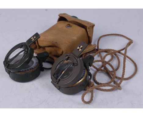 A green painted military compass marked Stanley London ST 05830 in webbing pouch marked ME Co 1940, together with one other S