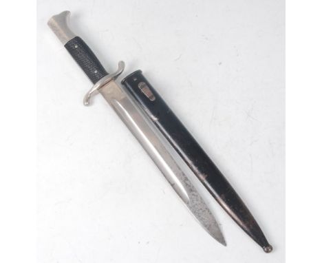 A German Third Reich fireman's dress dagger, the 24.5cm singled edged blade stamped to the ricasso Paul Seilheimer Solingen, 