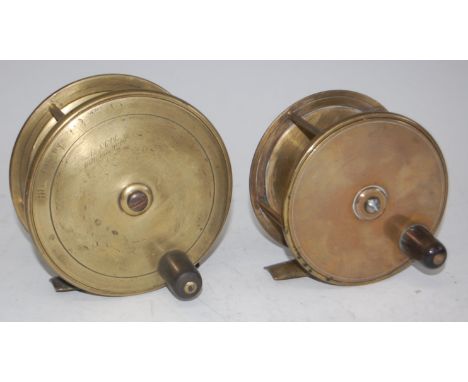 An Army &amp; Navy 5" brass centre pin salmon reel, together with one other unmarked brass 4" salmon reel. (2)