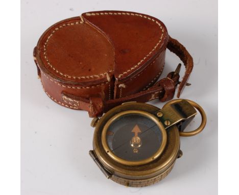 A WW I Verner's pattern brass cased compass stamped J.D.Mc.D, numbered verso 79055 and dated 1917, in a brown stitched leathe