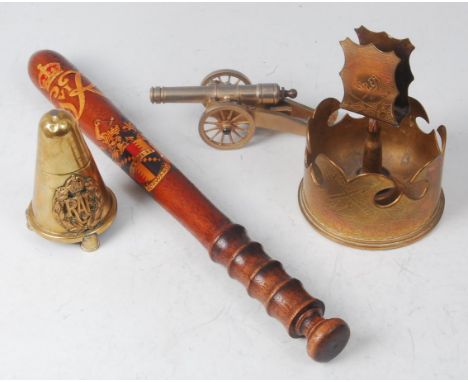 A trench art table cigarette lighter, having applied R.A.F. badge, together with a trench art matchbox holder/ashtray, a mode