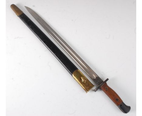 A British 1907 pattern bayonet, the 43cm single edged fullered blade stamped to the ricasso with a crowned GR cypher 1907 10 