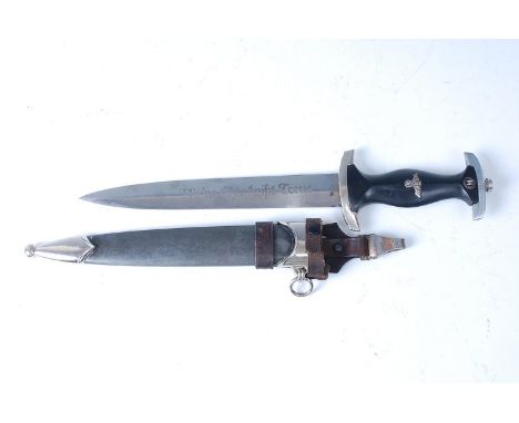 A German Shutzstaffel Officer's dagger, 1936 pattern, the 22cm double edged blade etched "Meine Ehre heisst Treue" (my Honour