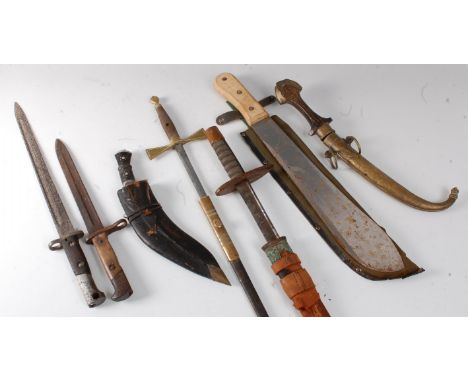 A Masonic ceremonial sword, in a brass mounted leather scabbard, together with various bayonets, a jambiya, a kukri, various 