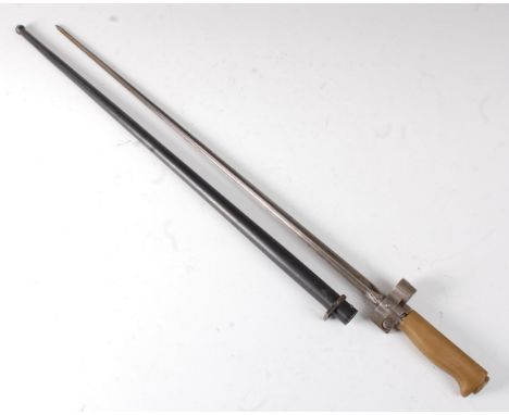 A French Model 1886/93/16 Lebel bayonet, having a 52cm cruciform blade, the muzzle ring stamped G 35267 with brass handle, ho