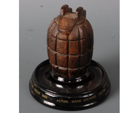 A novelty inkwell made from a WW I grenade, h.12cm.