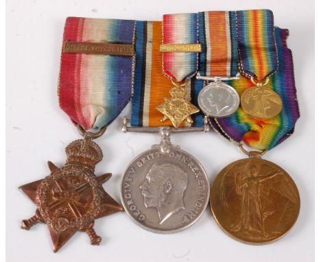 A WW I trio to include 1914 Mons Star with 5th Aug-22nd Nov clasp, naming 6450 PTE T. EAKETTS 1/GLOUC. R., British War and Vi