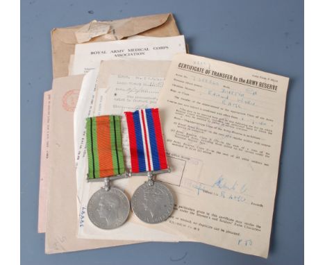 Attributed to 7358520 CPL Edward Walter Button R.A.M.C., a pair of WW II Defence and War medals together with various certifi