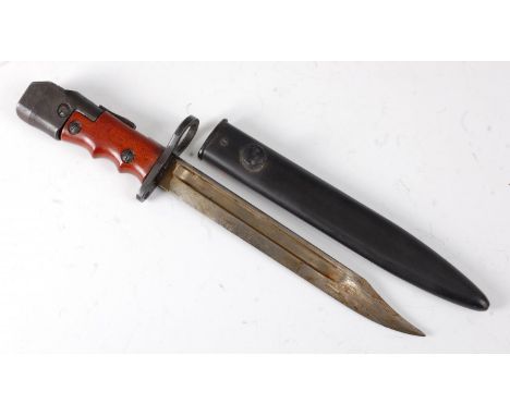 A British No.7 Mk I/L No.4 rifle / Mk V sten gun bayonet, having a 20cm Bowie type blade with two piece compositon grips and 