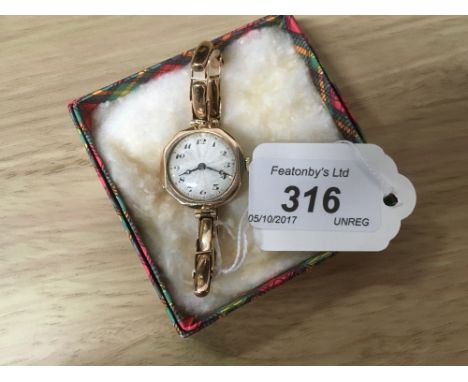 VINTAGE 9 CT GOLD WATCH WITH 9 CT GOLD STRAP , HALLMARKED 1929 ,GLASGOW 15 JEWELS SWISS MOVEMENT ( NOT SEIZED BUT IN NEED OF 