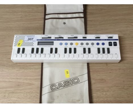 VINTAGE PORTABLE CASIO KEYBOARD ( NO BATTERY COVER )