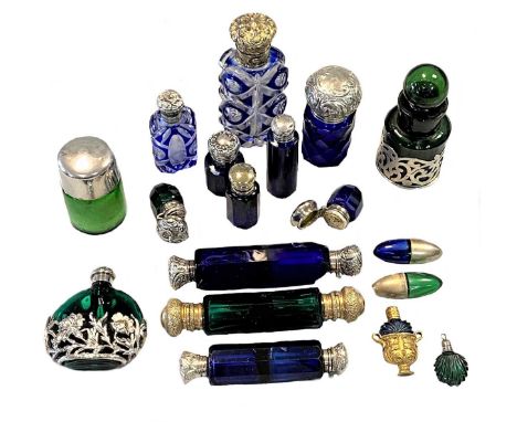 the 11 item blue glass collection including 2 double ended examples, 4 cylindrical examples (one with a silver top, Birmingha