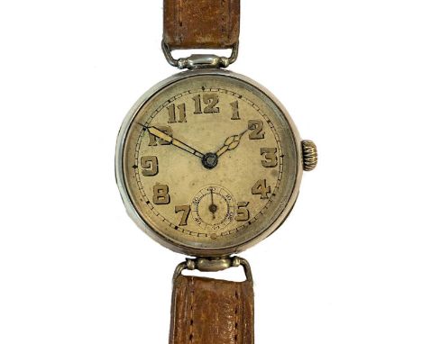 circa 1917, the unsigned circular cream coloured dial, 30mm diameter, with brown coloured Arabic numerals and hands and subsi