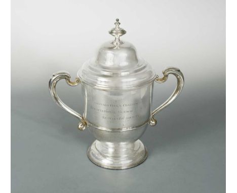 mark of Charles Stuart Harris, London 1921, of traditional form with reeded waist and two capped scroll handles, fully marked