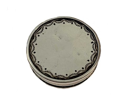 apparently unmarked, tests to Sterling silver standard, of circular form, the borders decorated with bright cut engraved swag
