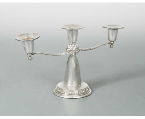 both with mark of Irish Silver Ltd, the candelabra, 1967, of squat form, the loaded circular base with a band of Celtic desig