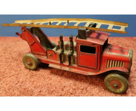 Pre-war tin-plate clockwork fire engine, the tyres marked Dunlop 90 150.17 