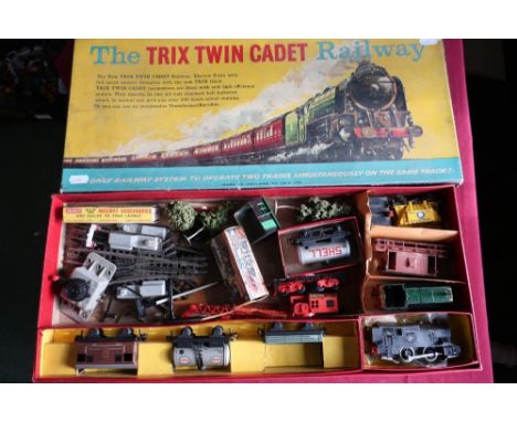 Boxed Trix Twin cadet railway set with various goods vehicles and diesel engine and a selection of three rail track 