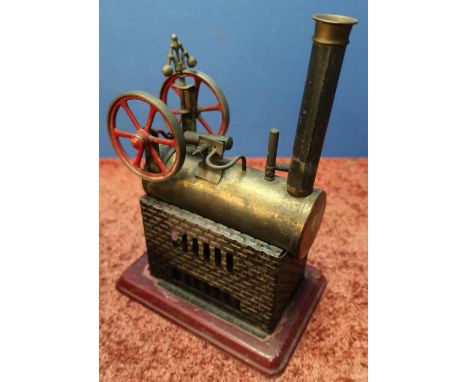 Early pre-war live steam engine with twin flywheel on rectangular base (17cm x 12cm x 24cm) 