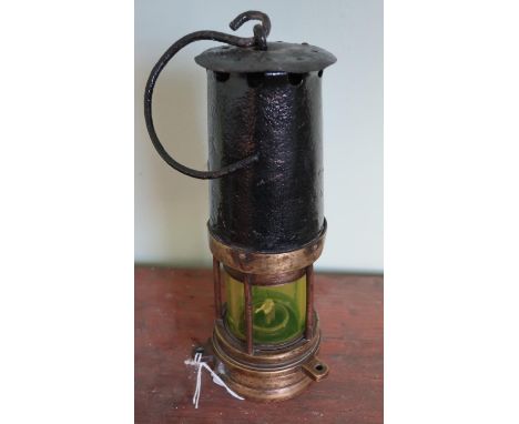 Miners type lamp with brass mounts 