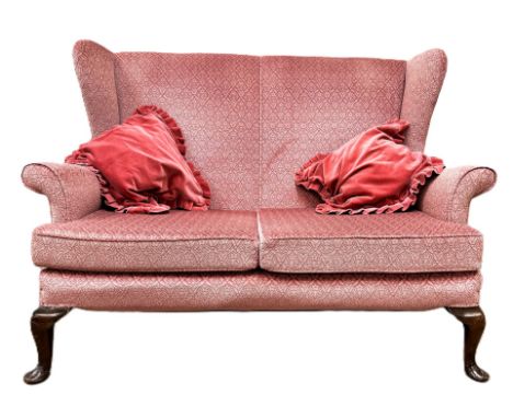 A Georgian style Parker Knoll two seater sofa, 97 x 136 x 70 cm.