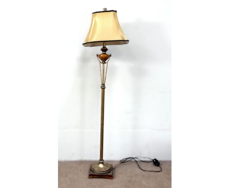 A modern metal standard lamp with wooden knop, 167 cm.