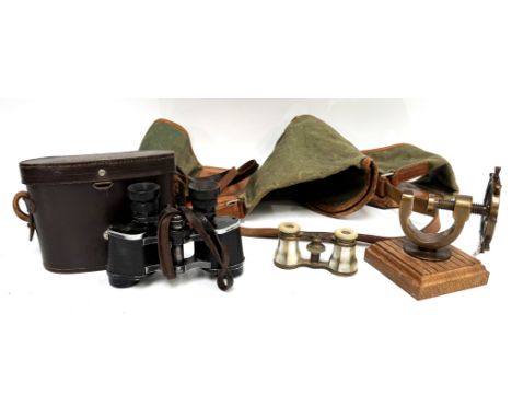 A pair of vintage binoculars, marked "Asra Sostraplast ASR", 11cm, also a pair of opera glasses, nut cracker and rifle soft c