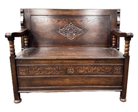 An oak monks bench, 101 x 120 x 60 cm (when bench).