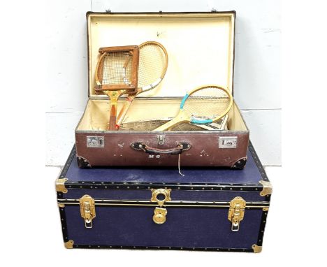 A vintage traveling case with three vintage tennis racquets and a wine travel case, also another trunk (A Lot).&nbsp;